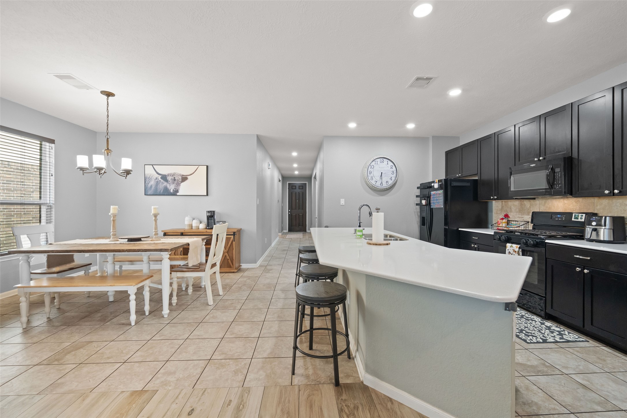 1118 Upton Court Conroe, TX 77304 - Photo 14 of 25 Dining and kitchen!
