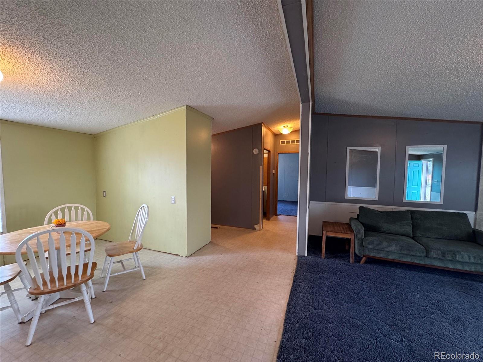 28983 County Road Aguilar, CO 81020 - Photo 17 of 24 a living room with furniture and a couch