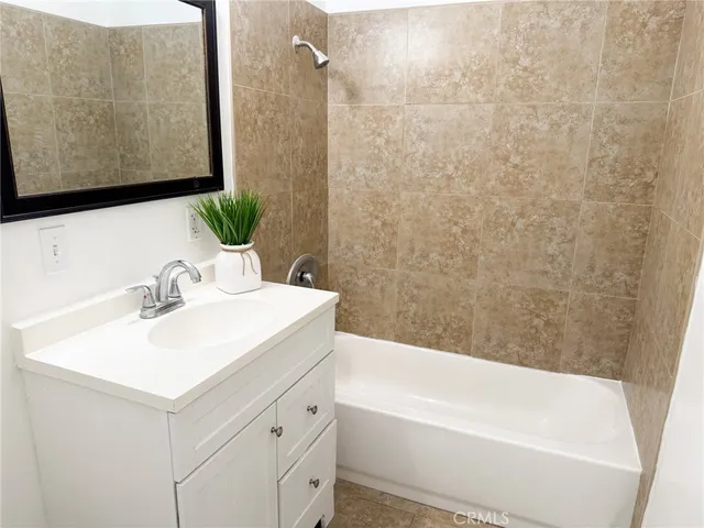 a bathroom with a sink and a bathtub