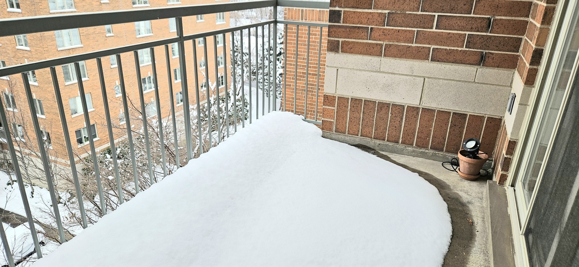 390 Western Avenue, Unit 702 Des Plaines, IL 60016 - Photo 11 of 19 a view of balcony with wooden floor