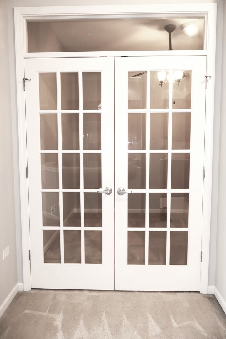 390 Western Avenue, Unit 702 Des Plaines, IL 60016 - Photo 7 of 19 a view of a house with a large window