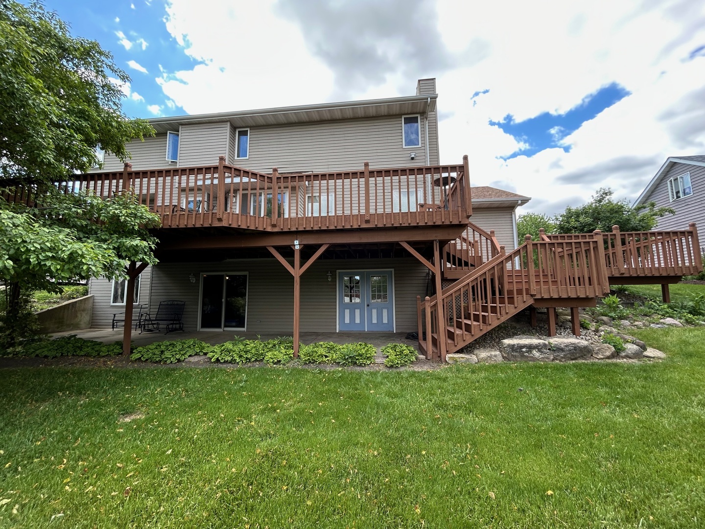 122 San Carlos Road Minooka, IL 60447 - Photo 29 of 35 a view of a house with a yard and deck