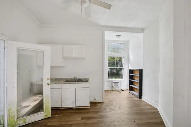 a kitchen with stainless steel appliances a stove and a refrigerator