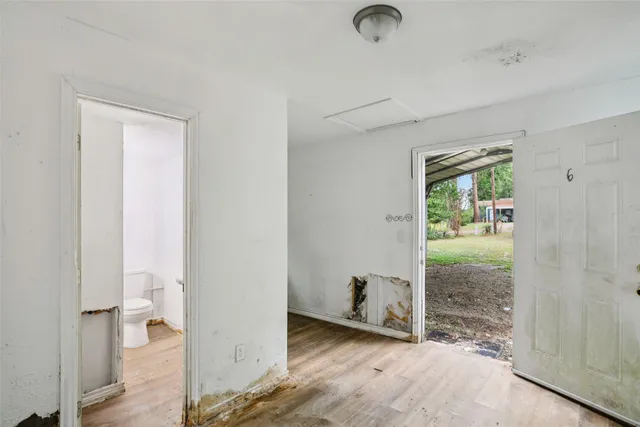 a view of entryway with wooden floor