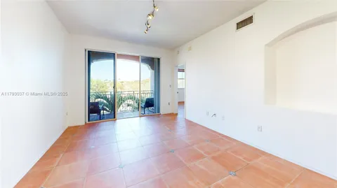 a kitchen with stainless steel appliances a stove sink and cabinets
