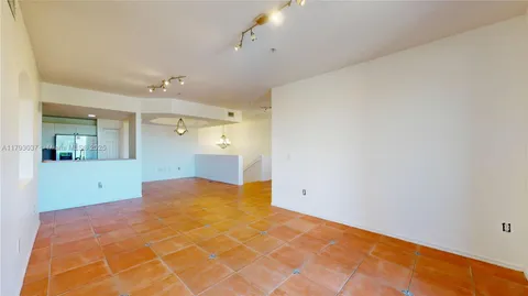 a view of a room with closet and windows