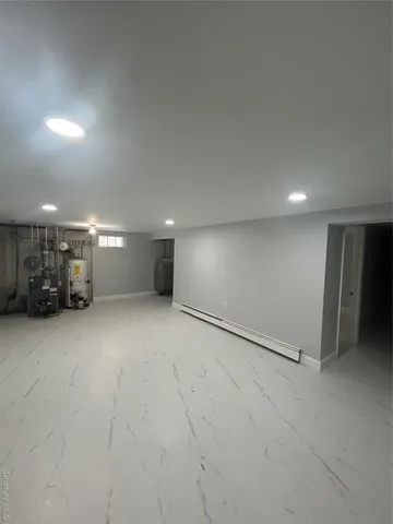 a view of an empty room with stairs