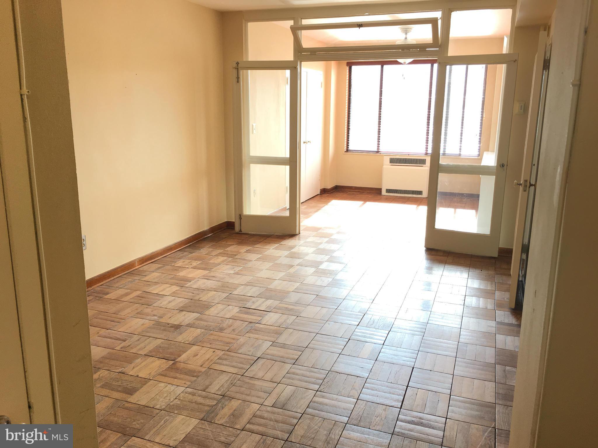 1 Scott Circle Northwest, Unit 510 Washington, DC 20005 - Photo 1 of 14 a view of an empty room and window