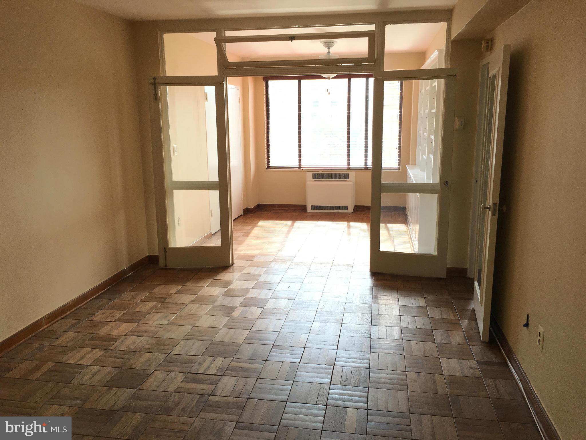 1 Scott Circle Northwest, Unit 510 Washington, DC 20005 - Photo 2 of 14 a view of an empty room and window