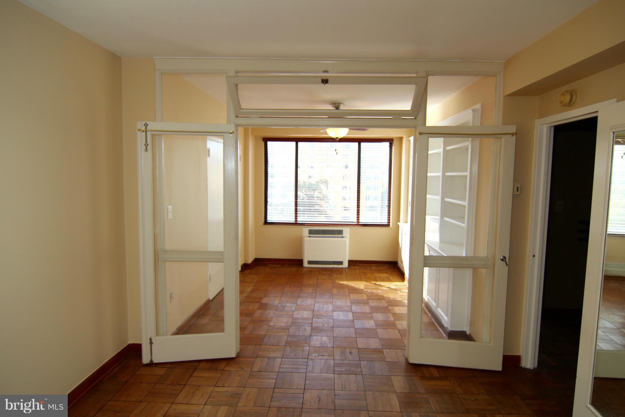 1 Scott Circle Northwest, Unit 510 Washington, DC 20005 - Photo 3 of 14 a view of a room with window and hardwood floor