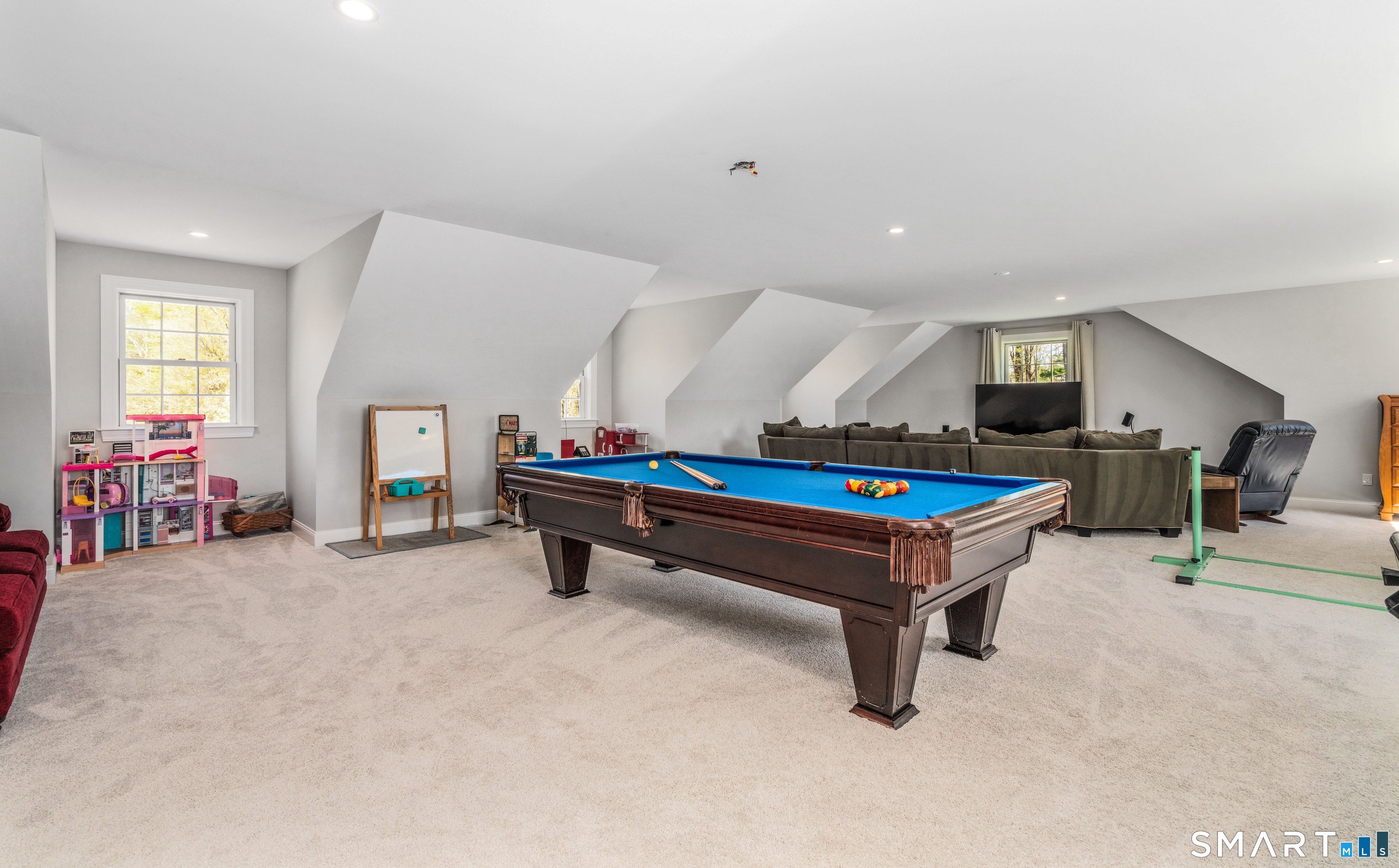 152 Old Farms Road Simsbury, CT 06070 - Photo 30 of 40 An incredible rec room is located above the garage with potential to add a full bathroom allowing flexibility as a future in-law or guest suite.