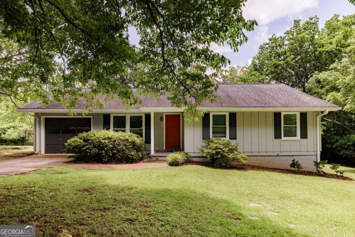 168 Pearl Street Athens, GA 30601 - Photo 1 of 43 a front view of house with yard outdoor seating and barbeque oven