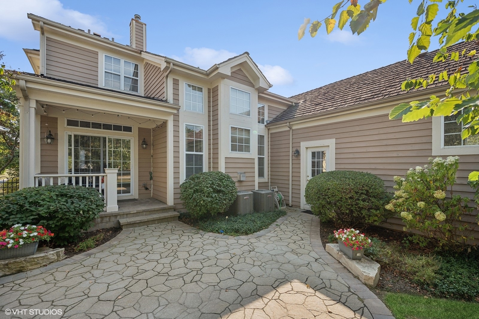 2362 Fielding Drive Glenview, IL 60026 - Photo 26 of 38 a view of a brick house with potted plants