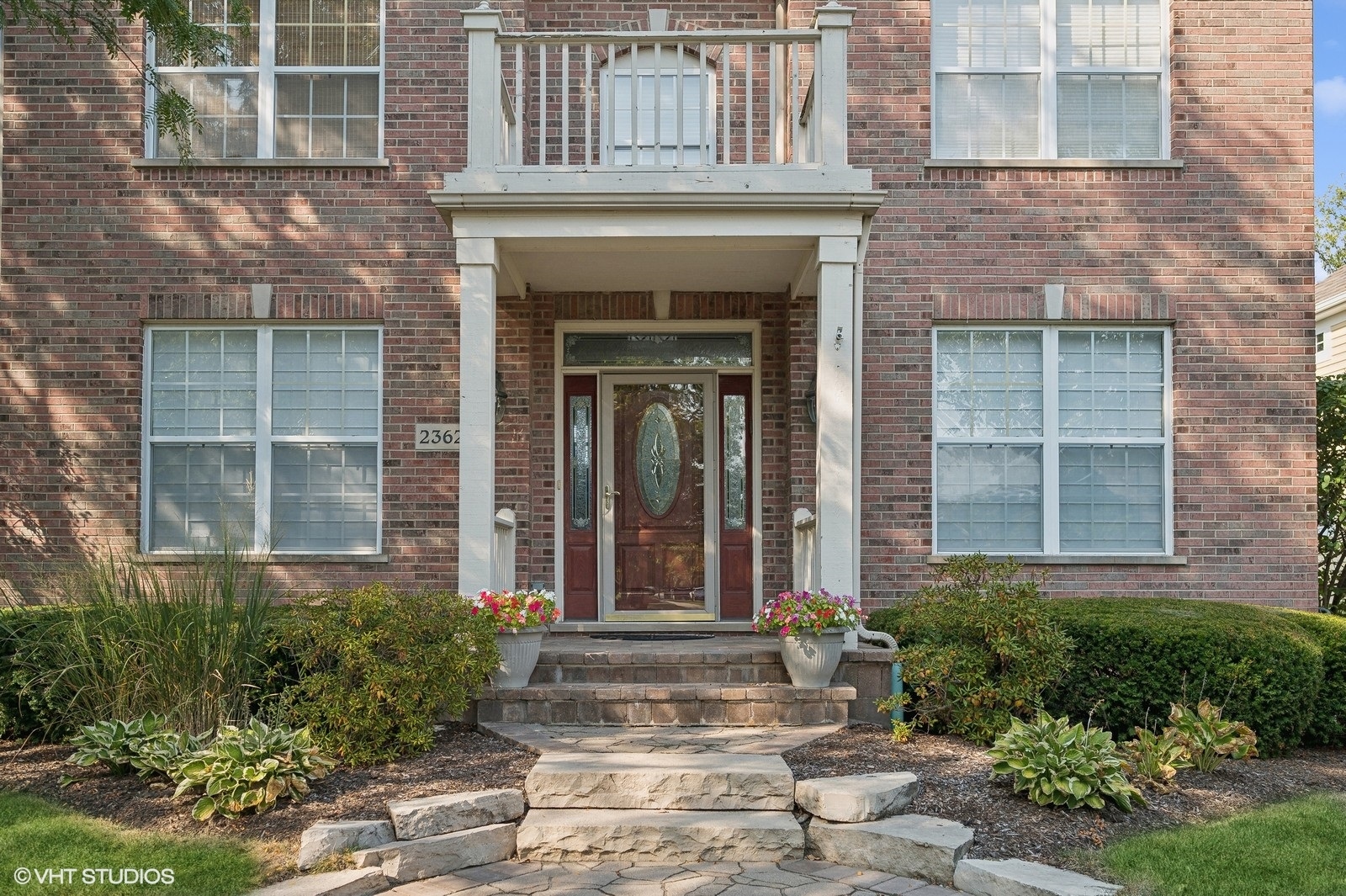 2362 Fielding Drive Glenview, IL 60026 - Photo 3 of 38 a view of entrance of the house with potted plants