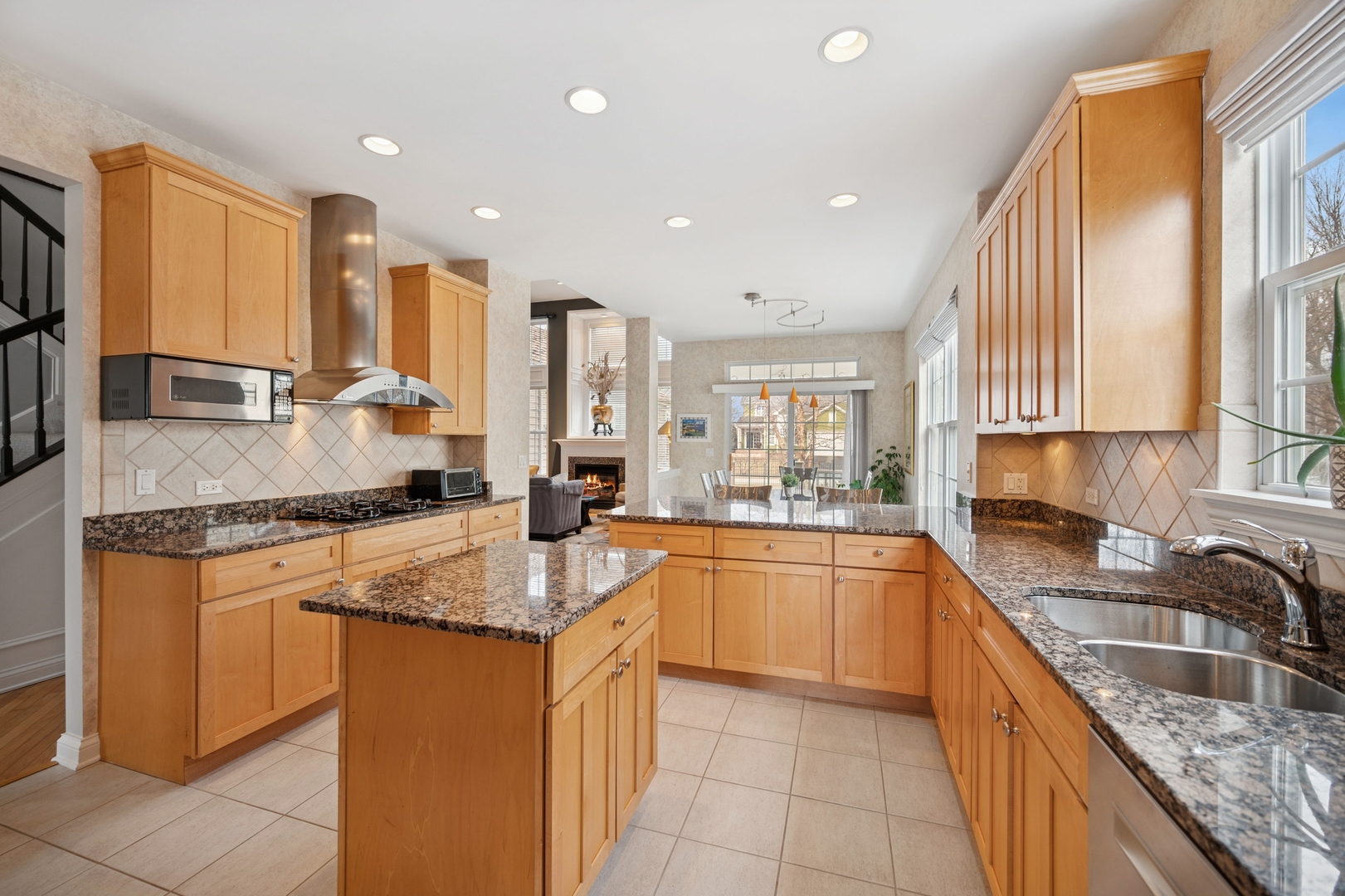 2362 Fielding Drive Glenview, IL 60026 - Photo 8 of 38 a kitchen with stainless steel appliances granite countertop sink stove and refrigerator