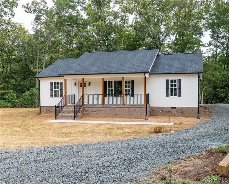 0 Howerton Road Dunnsville, VA 22454 - Photo 1 of 11 a house view with a outdoor seating space