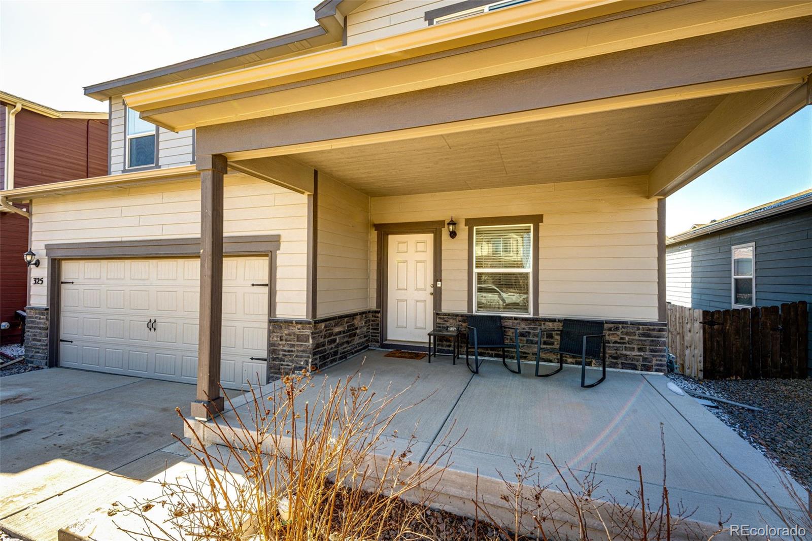325 Walnut Street Bennett, CO 80102 - Photo 4 of 22 a view of a house with sitting area