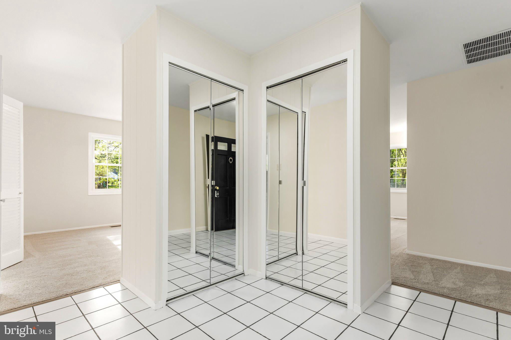 12605 Cedarbrook Lane Laurel, MD 20708 - Photo 8 of 35 Bright and airy entryway with closets.