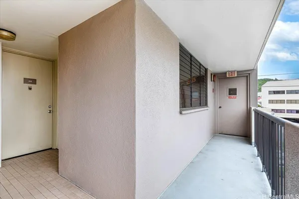 a view of a hallway with a kitchen