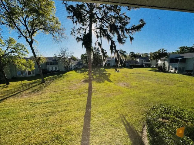 a front view of a building with garden