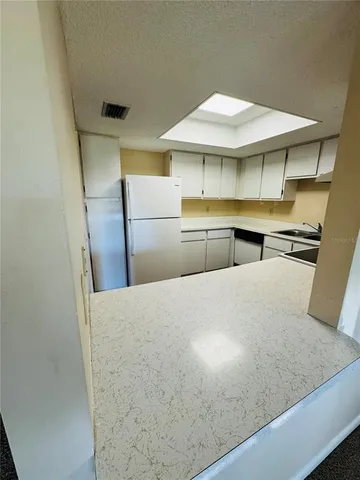 a room with storage and utility