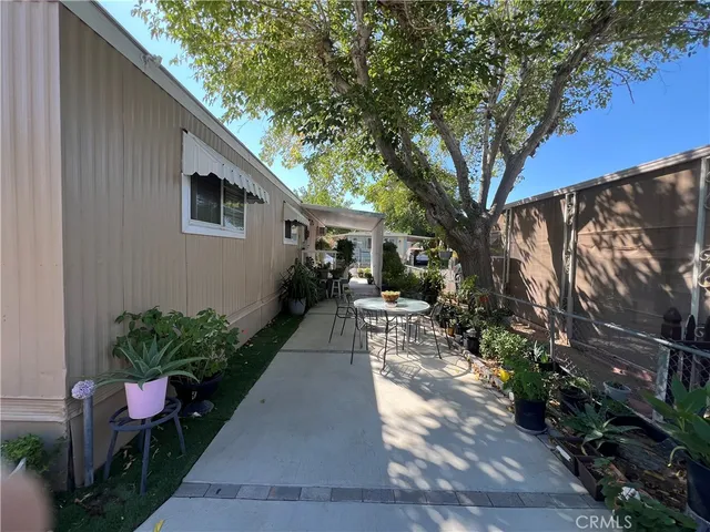 a porch with seating space and yard