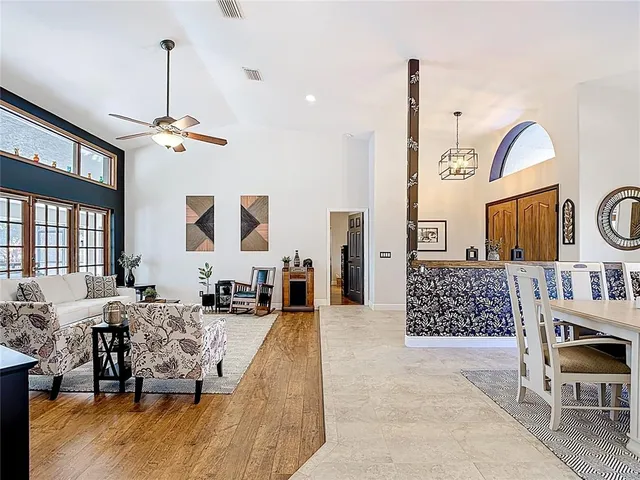 a kitchen with stainless steel appliances granite countertop a sink and cabinets