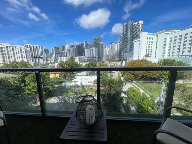 a view of city from a balcony
