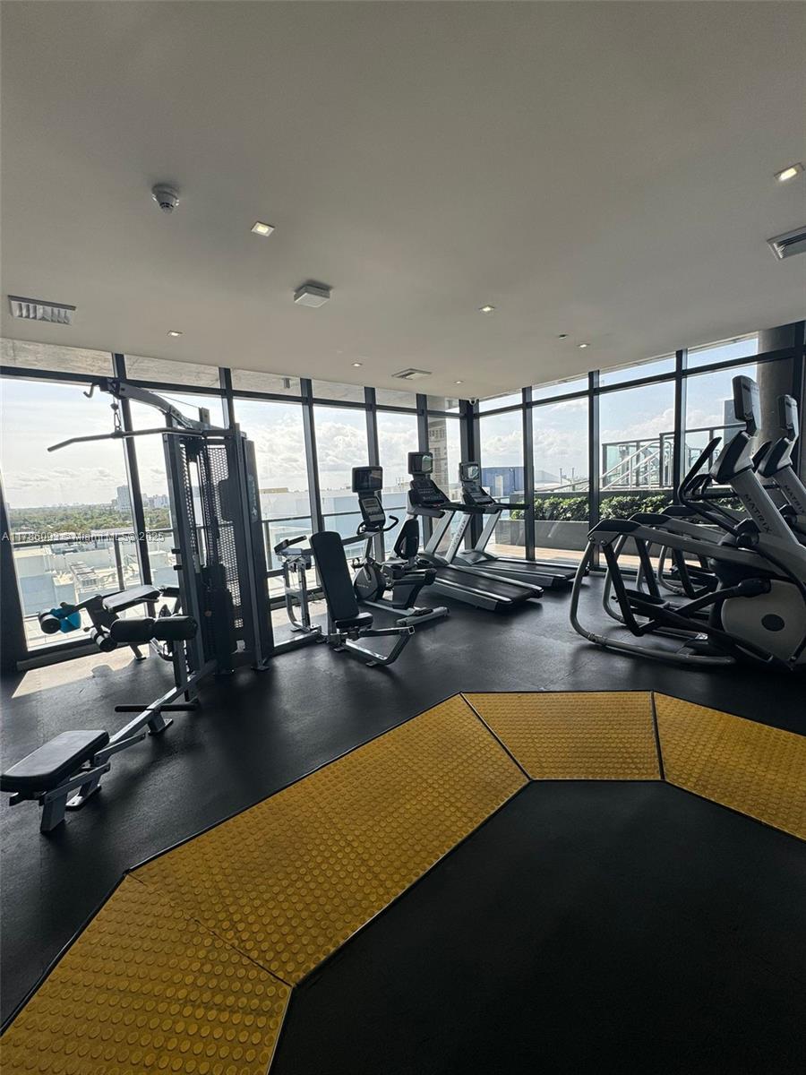 201 Southwest 17th Road, Unit 607 Miami, FL 33129 - Photo 24 of 31 a view of a living room and dining room