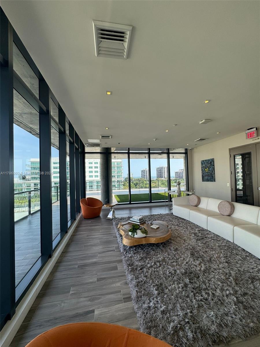 201 Southwest 17th Road, Unit 607 Miami, FL 33129 - Photo 31 of 31 a living room with furniture large windows