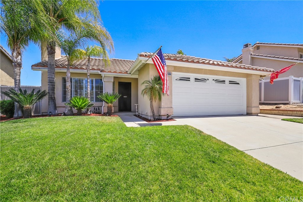 a view of a house with a garden
