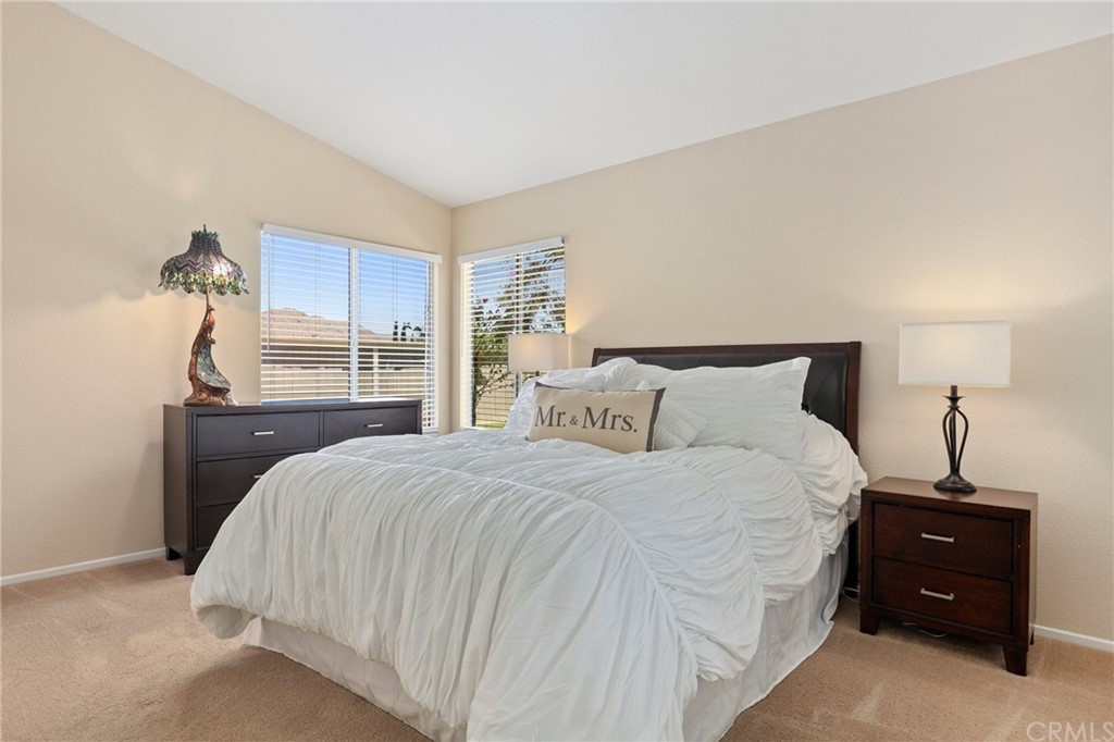 27002 Lightfoot Drive Corona, CA 92883 - Photo 15 of 31 a bedroom with a bed and a window