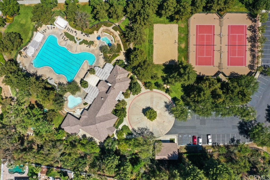 27002 Lightfoot Drive Corona, CA 92883 - Photo 30 of 31 an aerial view of a house with a swimming pool and a yard