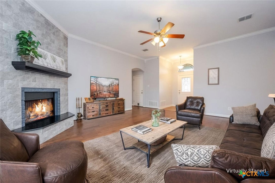 124 Prairie Circle Kempner, TX 76539 - Photo 2 of 34 a living room with furniture and a fireplace