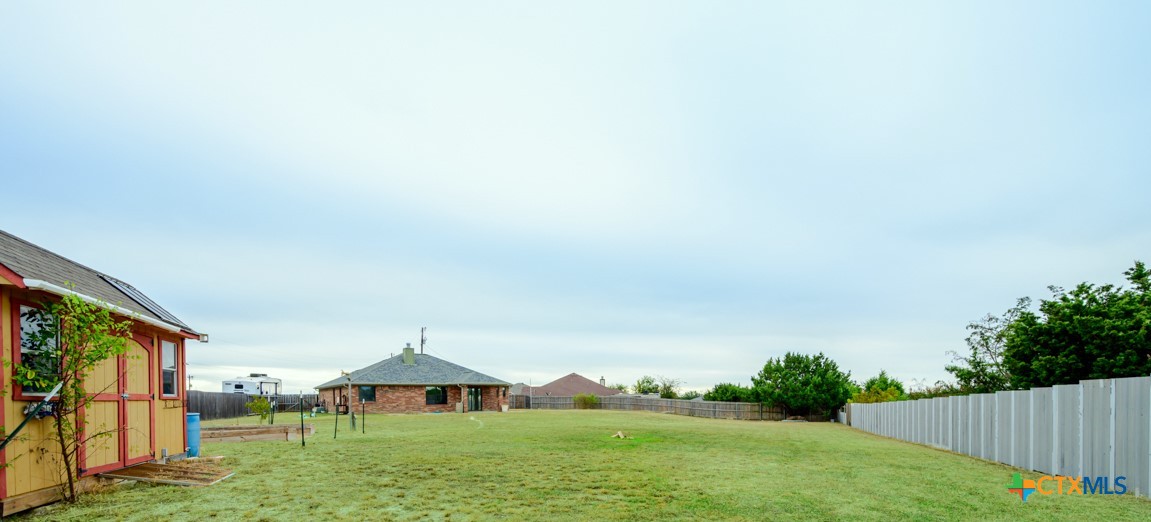 124 Prairie Circle Kempner, TX 76539 - Photo 33 of 34 a house with green field in front of it