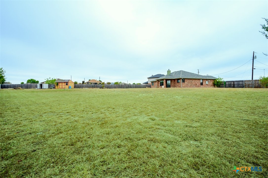 124 Prairie Circle Kempner, TX 76539 - Photo 34 of 34 a view of a lake with houses in the back