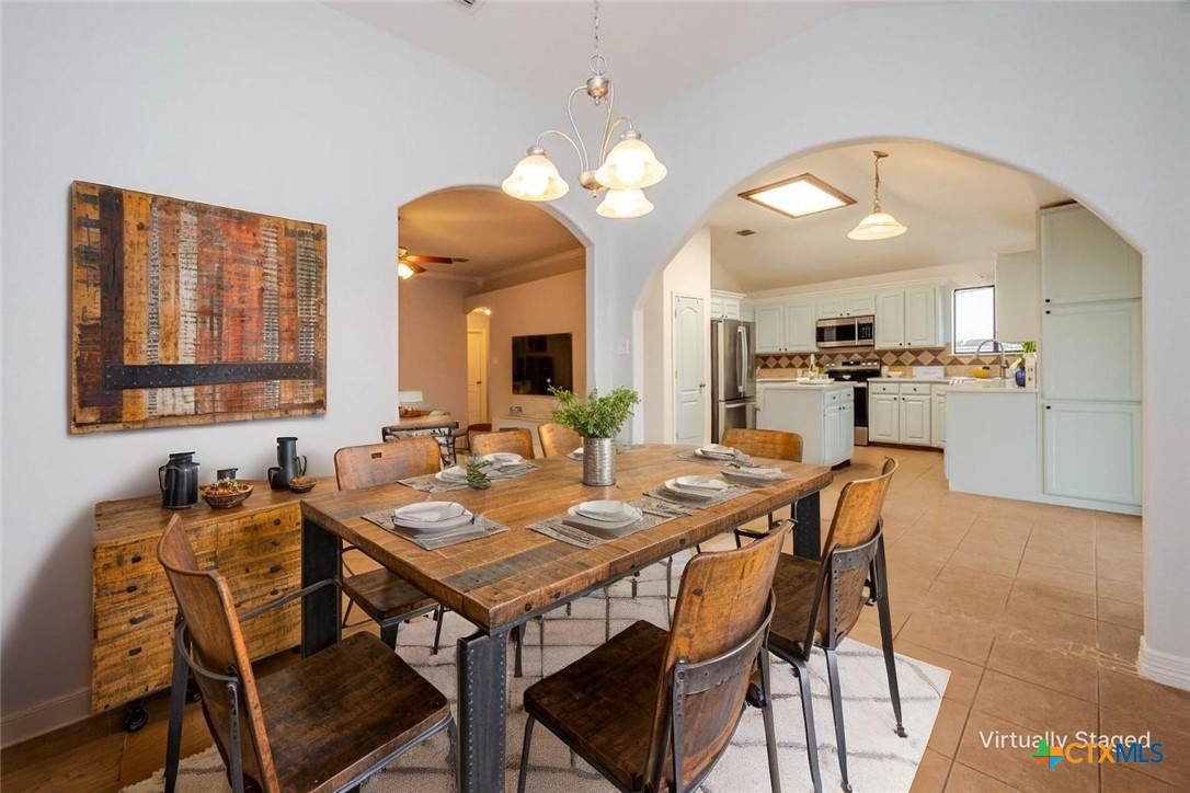 124 Prairie Circle Kempner, TX 76539 - Photo 7 of 34 a view of a dining room with furniture and a chandelier