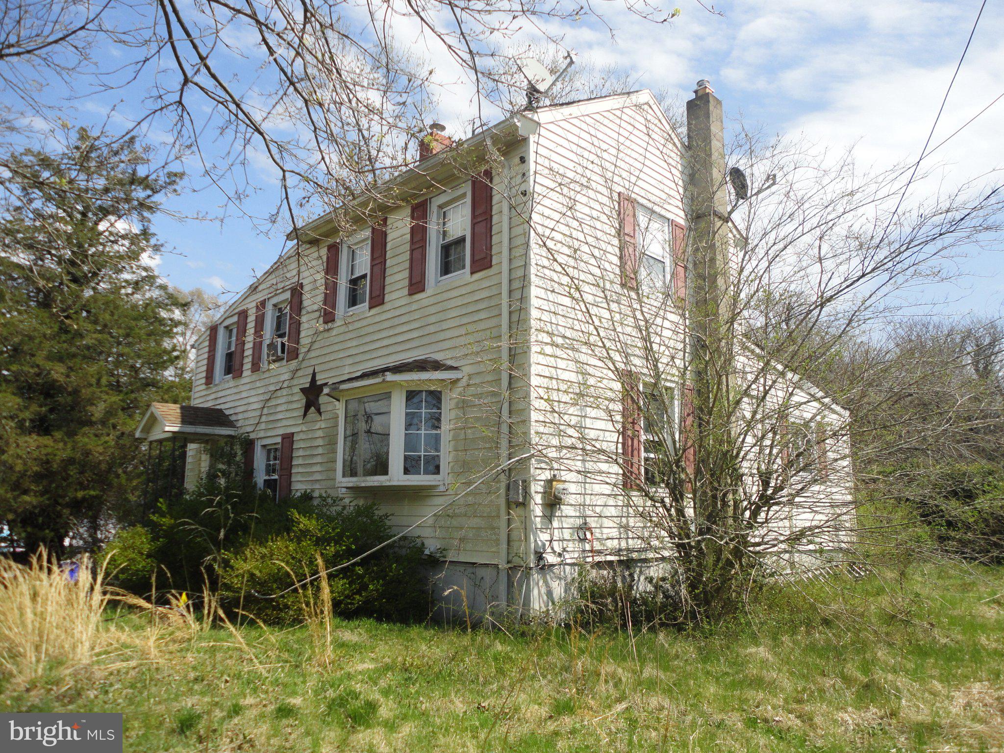 28 Main Street Bridgeton, NJ 08302 - Photo 20 of 29 front view of a house with a yard