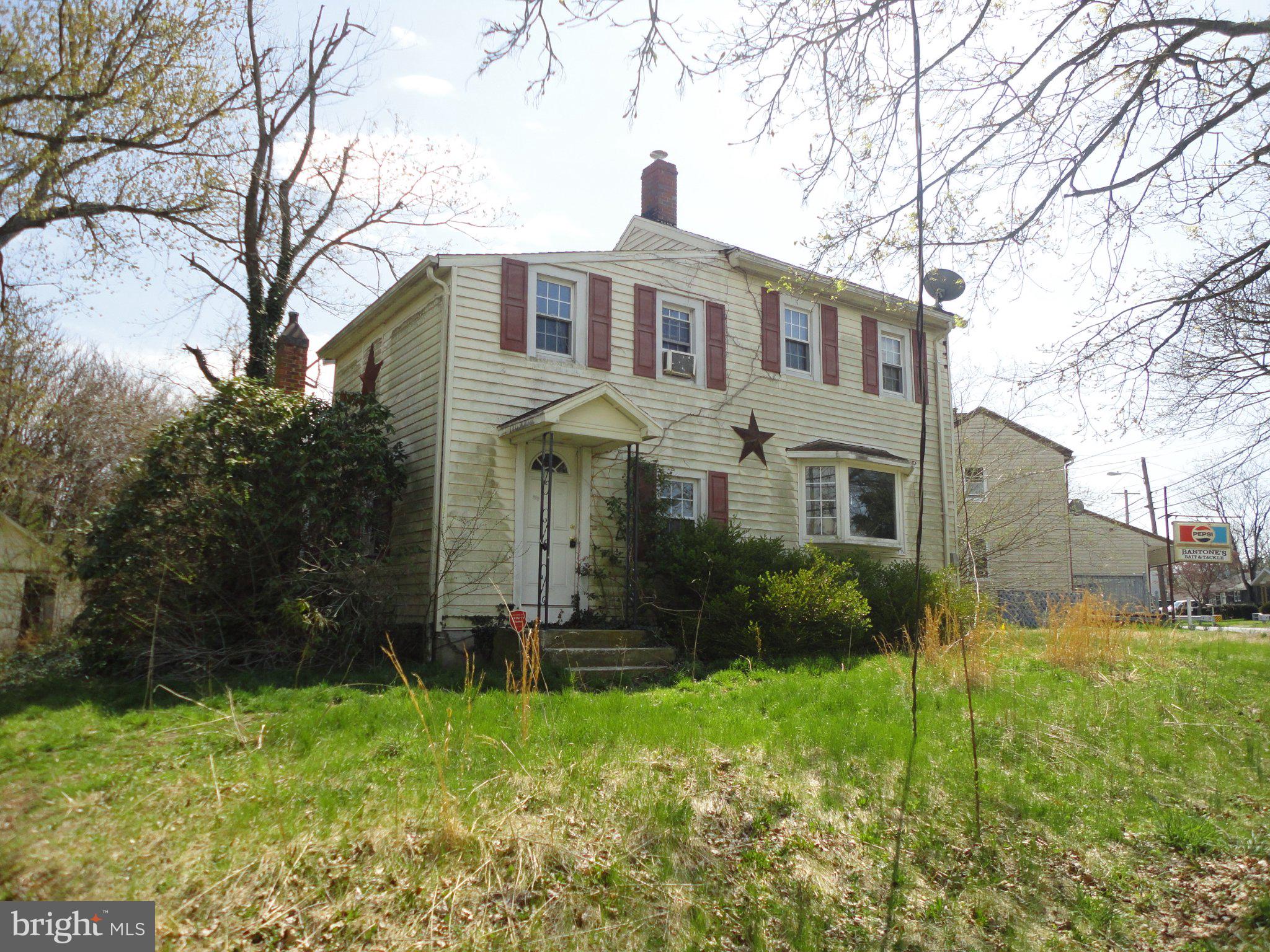 28 Main Street Bridgeton, NJ 08302 - Photo 22 of 29 a front view of a house with garden