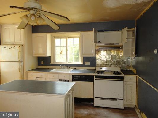 28 Main Street Bridgeton, NJ 08302 - Photo 6 of 29 a kitchen with a sink and cabinets