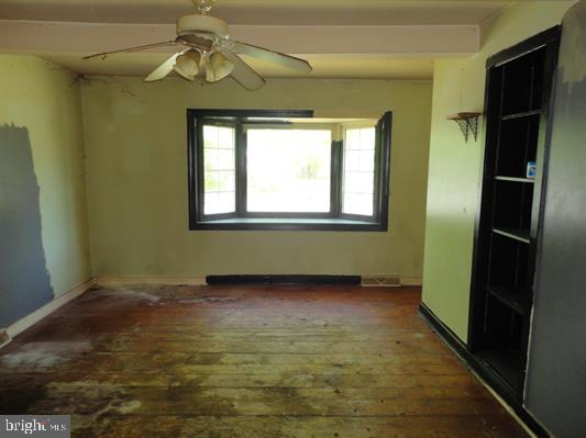 28 Main Street Bridgeton, NJ 08302 - Photo 9 of 29 a view of an empty room with a window