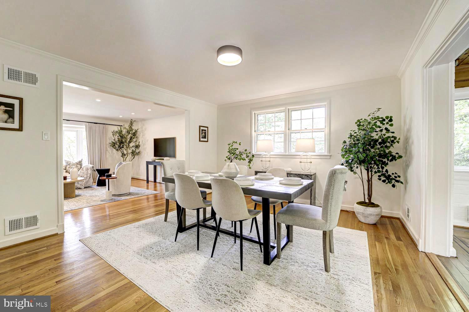 2824 Ellicott Street Northwest Washington, DC 20008 - Photo 13 of 47 a view of a dining room with furniture and wooden floor