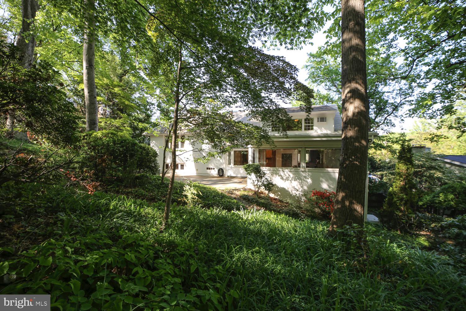 2824 Ellicott Street Northwest Washington, DC 20008 - Photo 29 of 47 a front view of a house with yard