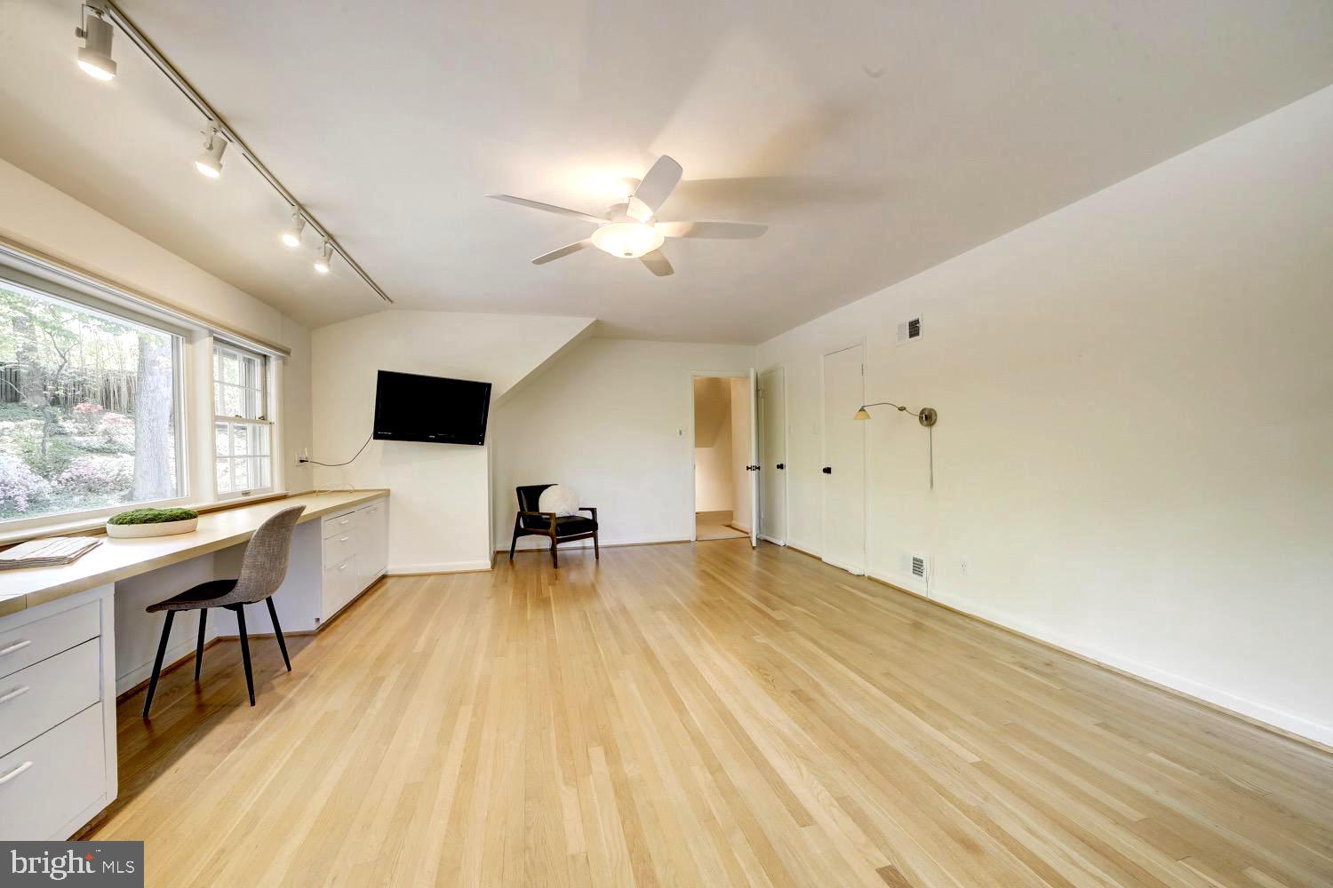 2824 Ellicott Street Northwest Washington, DC 20008 - Photo 41 of 47 a view of a livingroom with a flat screen tv