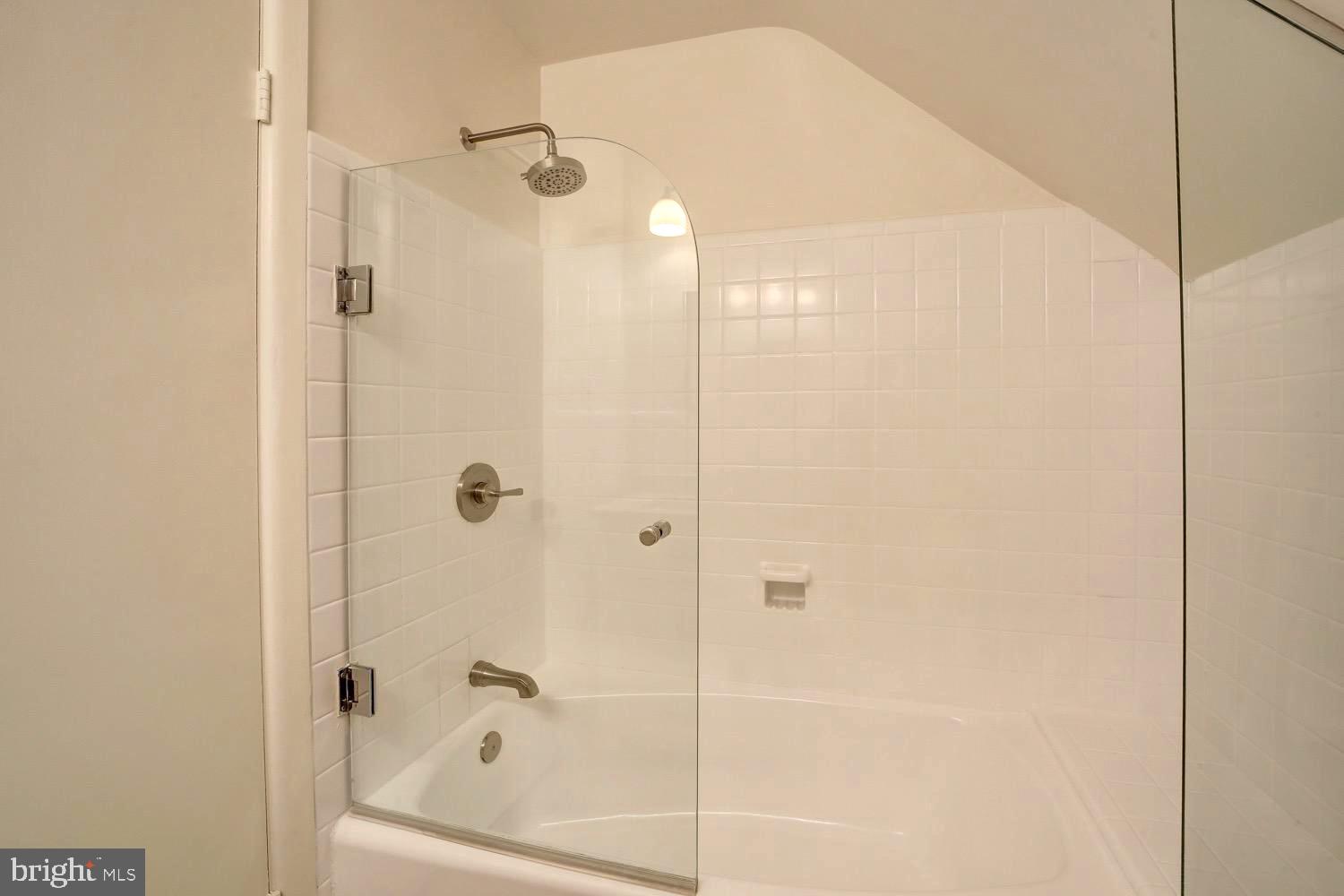2824 Ellicott Street Northwest Washington, DC 20008 - Photo 43 of 47 a bathroom with a shower