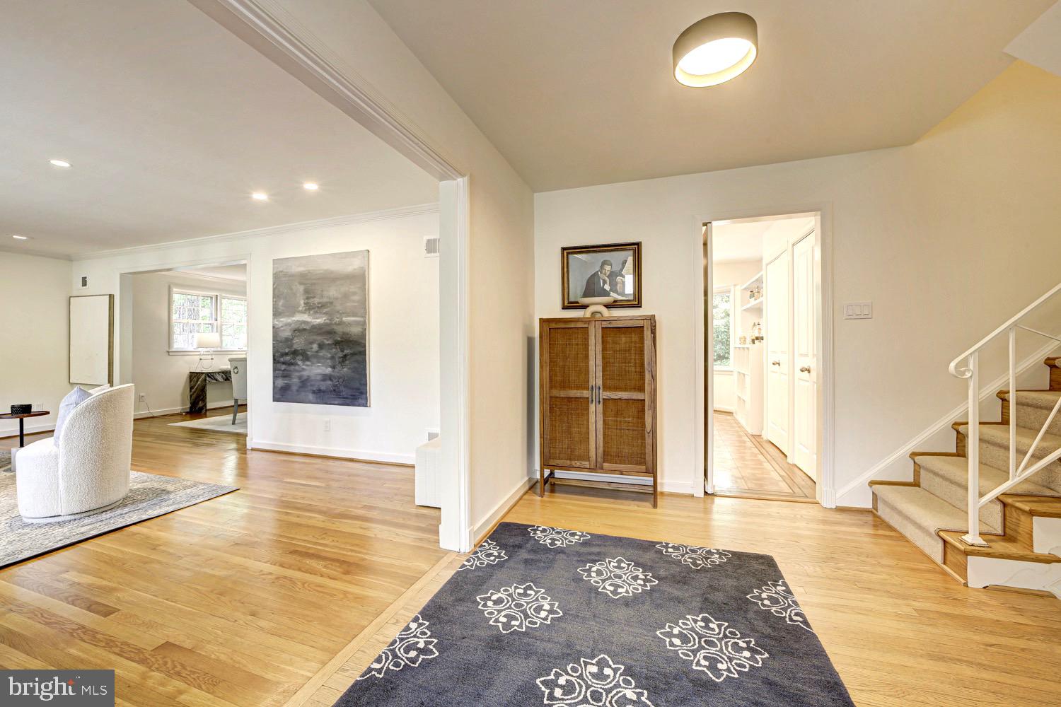 2824 Ellicott Street Northwest Washington, DC 20008 - Photo 6 of 47 a view of a livingroom with wooden floor and furniture