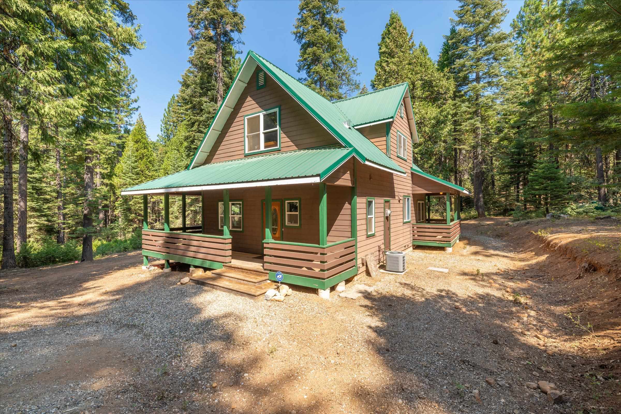 a view of house with a yard outdoor seating and yard