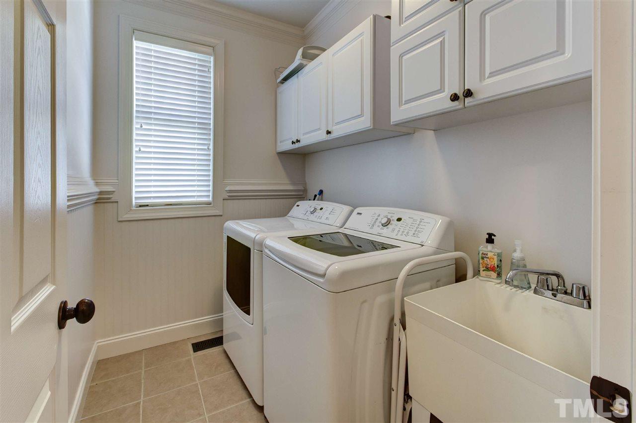 5804 Turner Store Lane Raleigh, NC 27603 - Photo 15 of 25 a utility room with dryer and washer