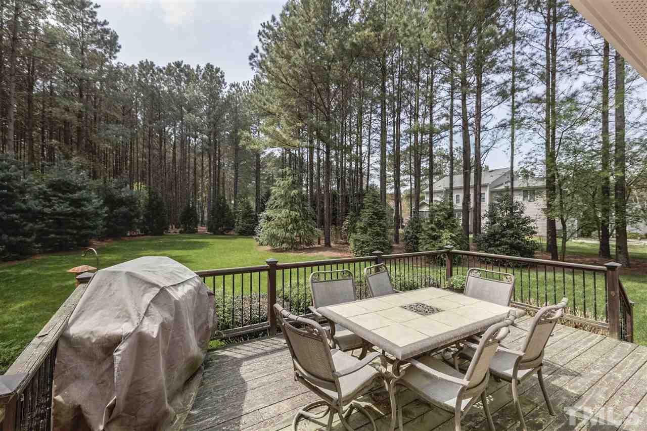 5804 Turner Store Lane Raleigh, NC 27603 - Photo 23 of 25 a view of a chairs and table on the deck