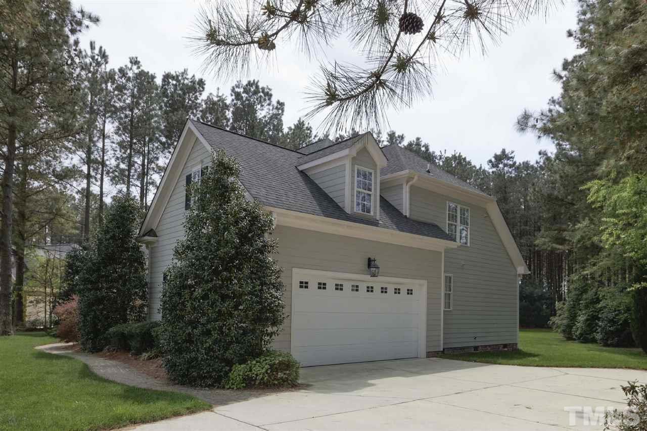 5804 Turner Store Lane Raleigh, NC 27603 - Photo 24 of 25 a view of a house with a palm tree